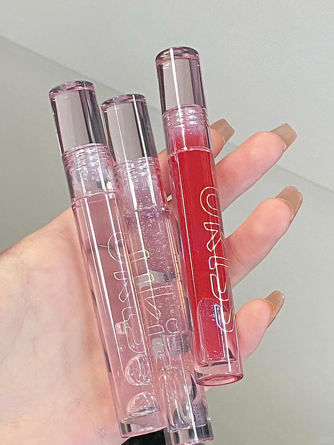 ukiss旗舰店:16.8元! UKISS透明唇釉 水光滋润玻璃嘟嘟镜面唇彩-3